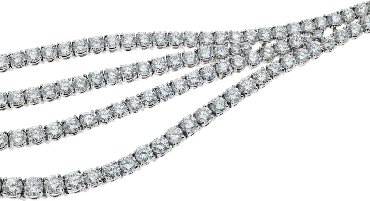 Four strand draping diamond necklace and dangling earring set in 18k white gold