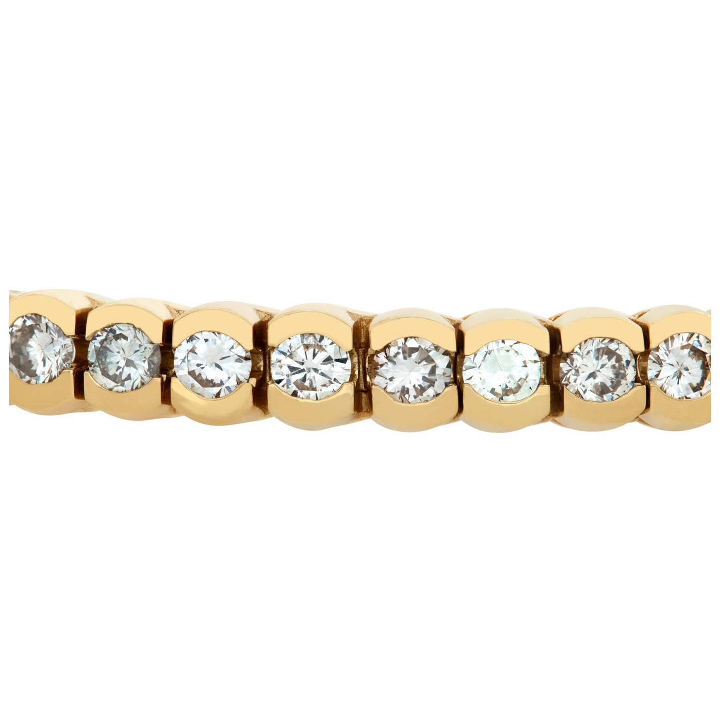 Diamond tennis bracelet in 14k yellow gold with over 7 carats in round diamonds