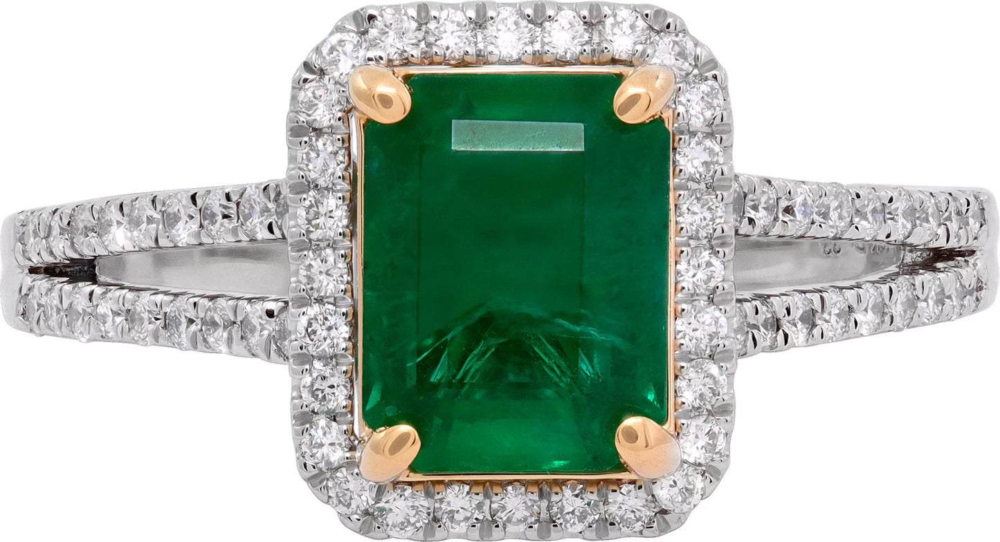 Emerald cut emerald & diamond ring in platinum & 18K yellow gold