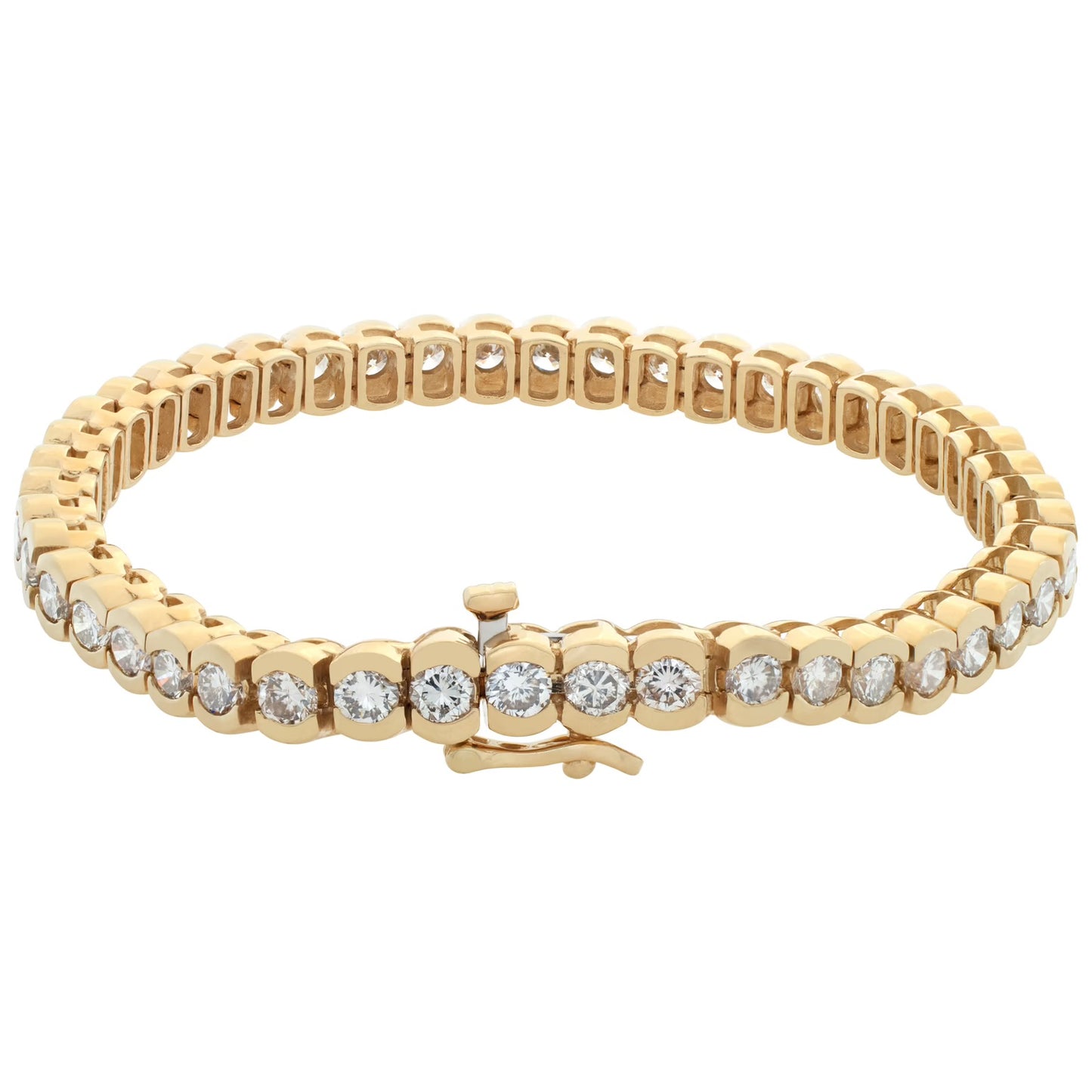 Diamond tennis bracelet in 14k yellow gold with over 7 carats in round diamonds