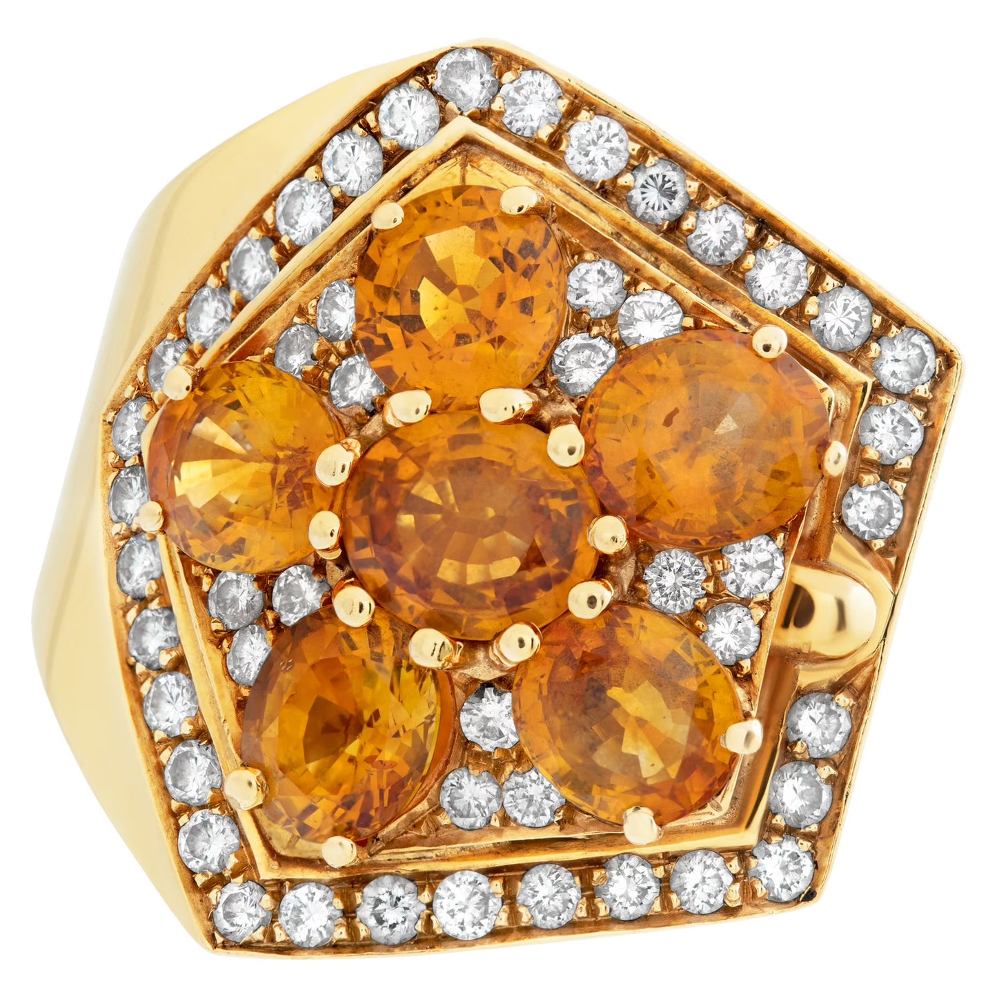 Oval brilliant cut orange sapphire & diamond ring set in 18K gold. Orange sapphires approx total weight over 7.00 carats. Round brilliant cut diamonds approx total weight: 1.00 carat