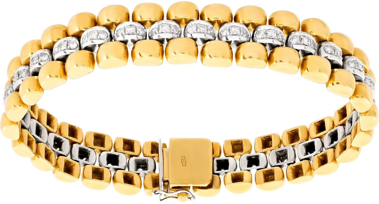 Diamonds line bracelet in 18K white and yellow gold.