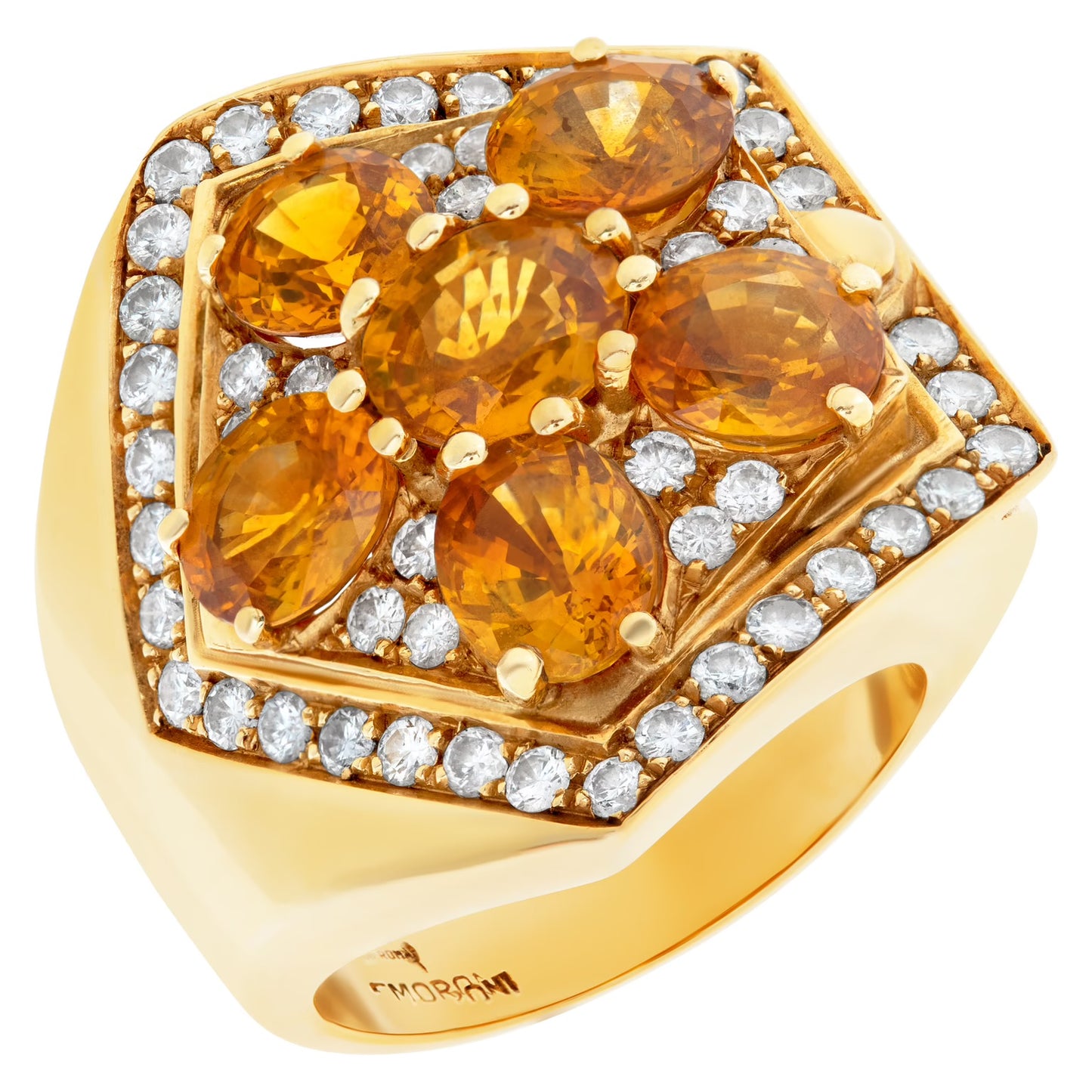 Oval brilliant cut orange sapphire & diamond ring set in 18K gold. Orange sapphires approx total weight over 7.00 carats. Round brilliant cut diamonds approx total weight: 1.00 carat